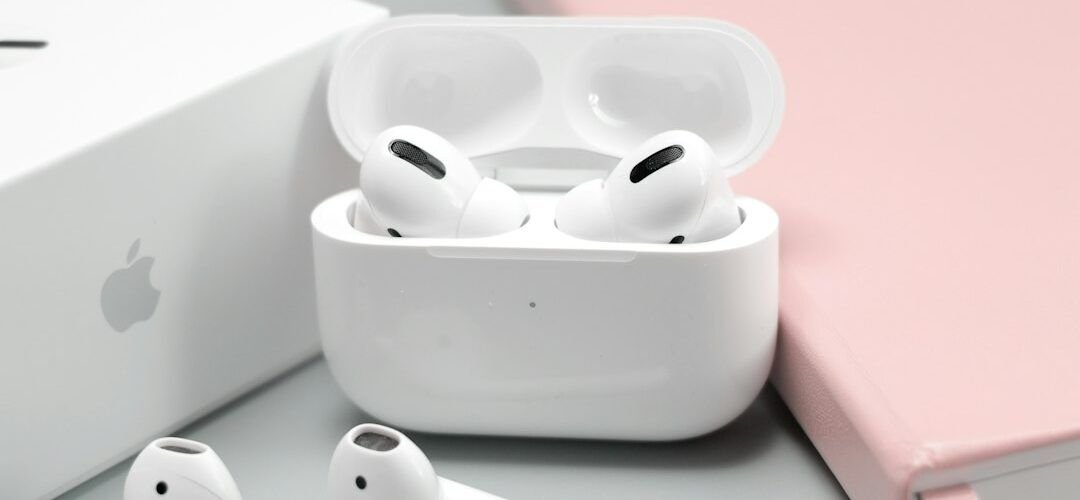 AirPods and AirPods Pro beside an open charging case
