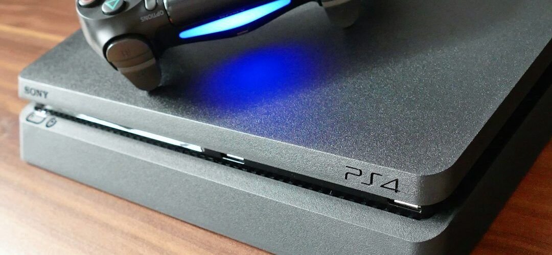 PS4 console with a DualShock controller on top