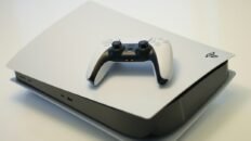 DualSense controller resting on a PlayStation 5 console